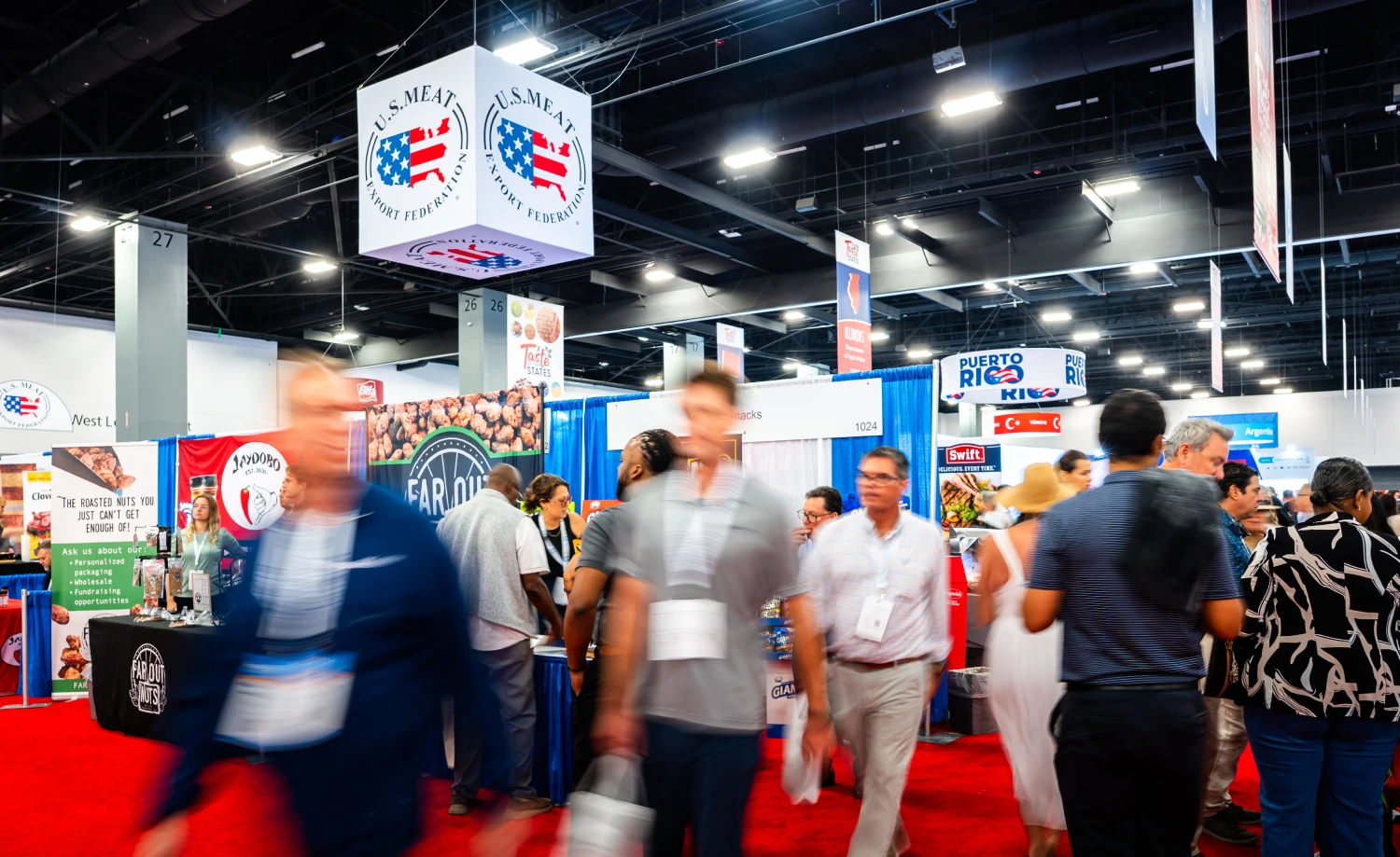 Attendees and exhibitors on the show floor at the Americas Food & Beverage Show & Conference